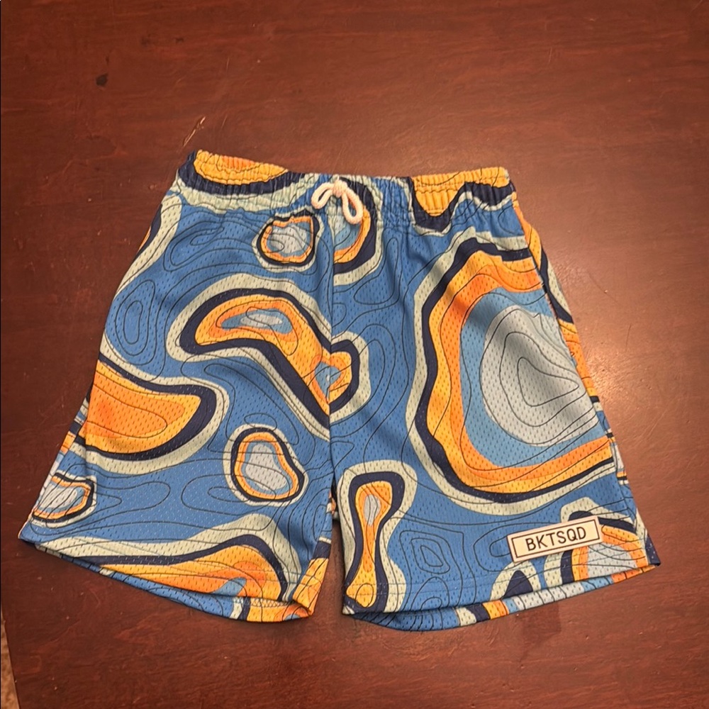 BKTSQD Blue and Orange Patterned Shorts. Youth Large. Runs small.